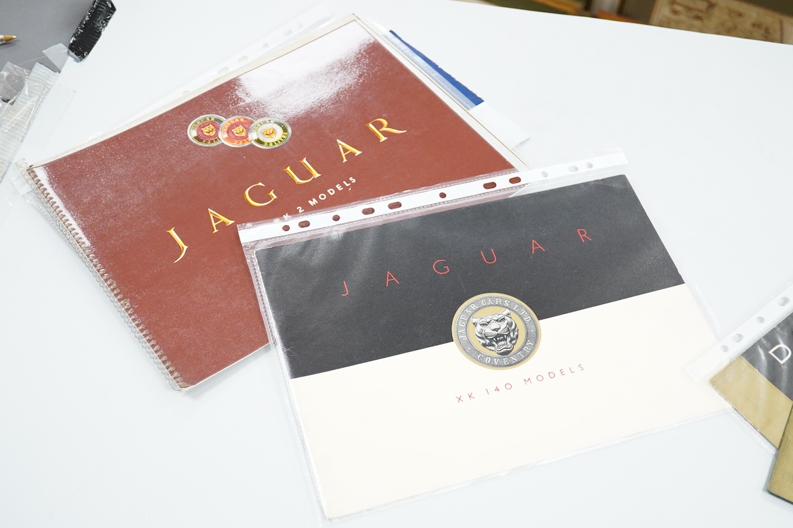 Six 1930s to 1960s Jaguar and Daimler motor car manufacturer’s brochures; the Daimler 15 (produced 1932-37), a folding poster of the 1930s Daimler range, the Jaguar XK140 (produced 1954-57), the Jaguar Mk.II (produced 19